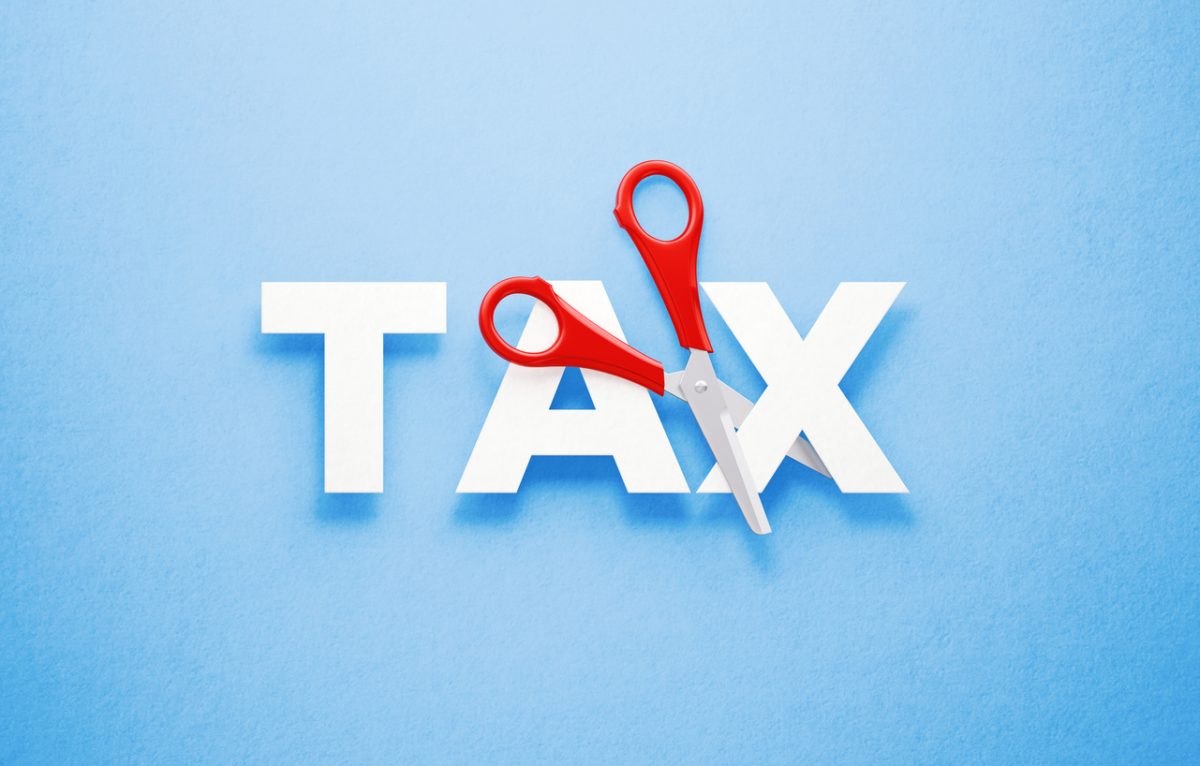Graphic of the word Tax with scissors representing tax changes in the new Tax Year